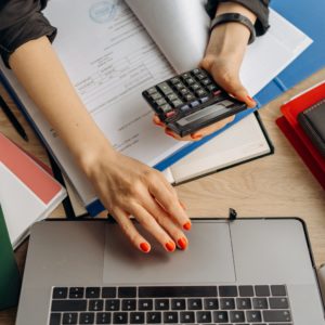 tax preparation services, laptop, calculator